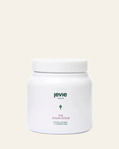 White jar of 'The Sugar Scrub' by Jevie on a white background