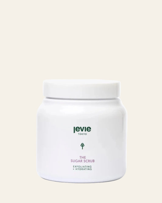 White jar of 'The Sugar Scrub' by Jevie on a white background