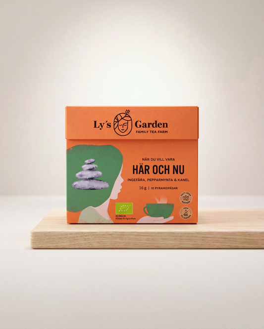 Ly's Garden tea box on a wooden surface with a light background